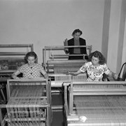 Cover image of Banff School of Fine Arts, Three Girls Weaving. -- 1946