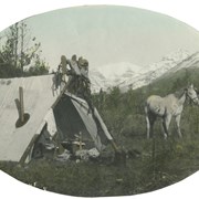 Cover image of Dr. Harvey and 'Fox', Pass Creek, 1910, Sept. Hunting Trip