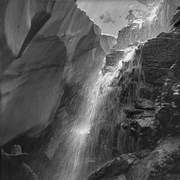 Cover image of [Man posed next to waterfall and glacier]