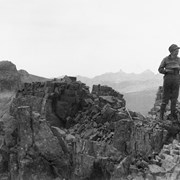 Cover image of Dora Riggall on summit of Font Mountain, Sept 1929