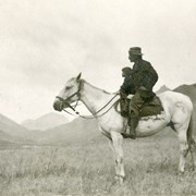 Cover image of [Bert Riggall and Dickie Riggall on horseback]
