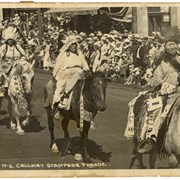 Cover image of Flora (Crawler) McLean (2nd to left), George McLean (Tatâga Mânî) (Walking Buffalo) (right) "H-6 Calgary Stampede Parade"