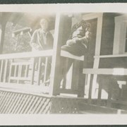 Cover image of "On the porch of our cabin at Radium"