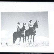 Cover image of 2 mounties on horseback. -- [ca.1940]