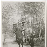 Cover image of Elva Simmons on Mustang in White's yard