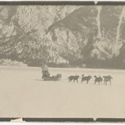 Cover image of From movie film - 35mm - Jim MacIntosh and Alma Rubens, 4 malamutes on lake Minnewanka