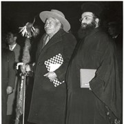 Cover image of George McLean (Tatâga Mânî) (Walking Buffalo) and priest[?]