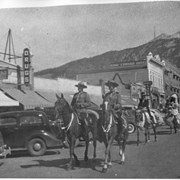 Cover image of [Two R.C.M.P. officers on horseback on Banff Avenue]