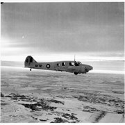 Cover image of Double prop airplane in flight