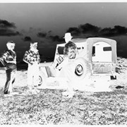 Cover image of Three unidentified people with jeep - negative