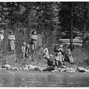 Cover image of [Group of people on a river bank]