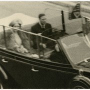 Cover image of King George VI and Queen Elizabeth in car - blurry