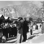 Cover image of Group of people on Banff Avenue in winter