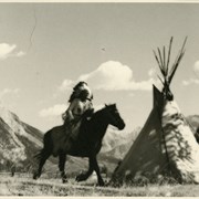 Cover image of Unidentified First Nations person on horseback - blurry