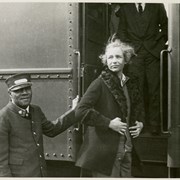 Cover image of Unidentified woman boarding a train