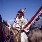 Cover image of Unidentified man in regalia on horseback