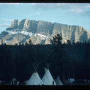 Cover image of Tipis and view of Rundle Mountain at Banff Indian Days