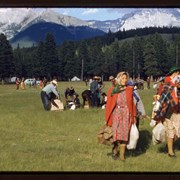 Cover image of Elizabeth Twoyoungmen in red jacket and possibly Reba (Bearspaw) Powderface carrying rations