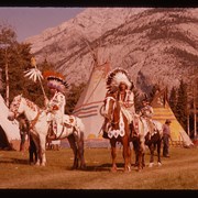 Cover image of Unknown individuals on horseback at Banff Indian Days camp