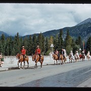 Cover image of Banff Indian Days parade on Bow River Bridge