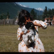 Cover image of Unknown girl and puppy