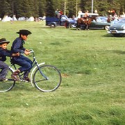 Cover image of Two boys on a bicycle