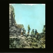Cover image of Hikers resting on loose rock