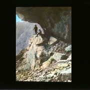 Cover image of Hikers under rock